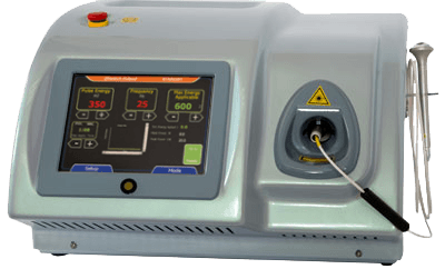 A medical device with a digital display and controls, featuring a nozzle and a connected tool on the right side.